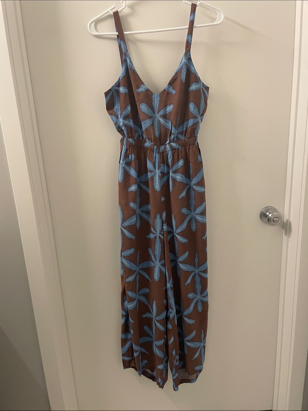 LOFT Brown Jumpsuit with Blue Floral Print and open tie back. Never worn!